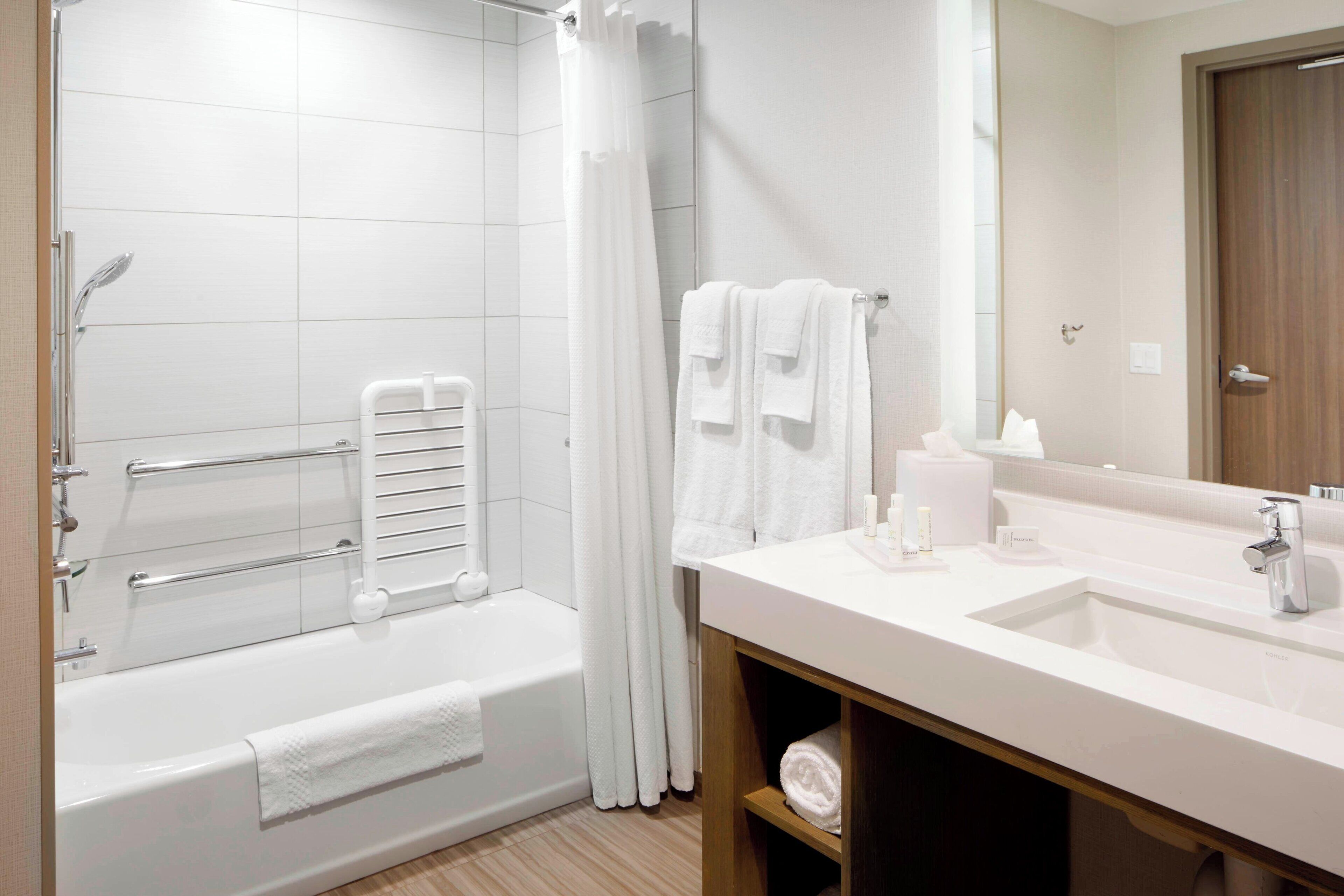 eco-friendly toiletries, hair dryer, towels