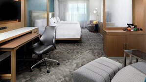 A hotel room with a bed, desk, chair, and a TV. - Courtyard by Marriott Charlotte Fort Mill, SC (Fort Mill)