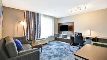 Suite, 2 Bedrooms | Living room | 32-inch Smart TV with cable channels, TV, Netflix