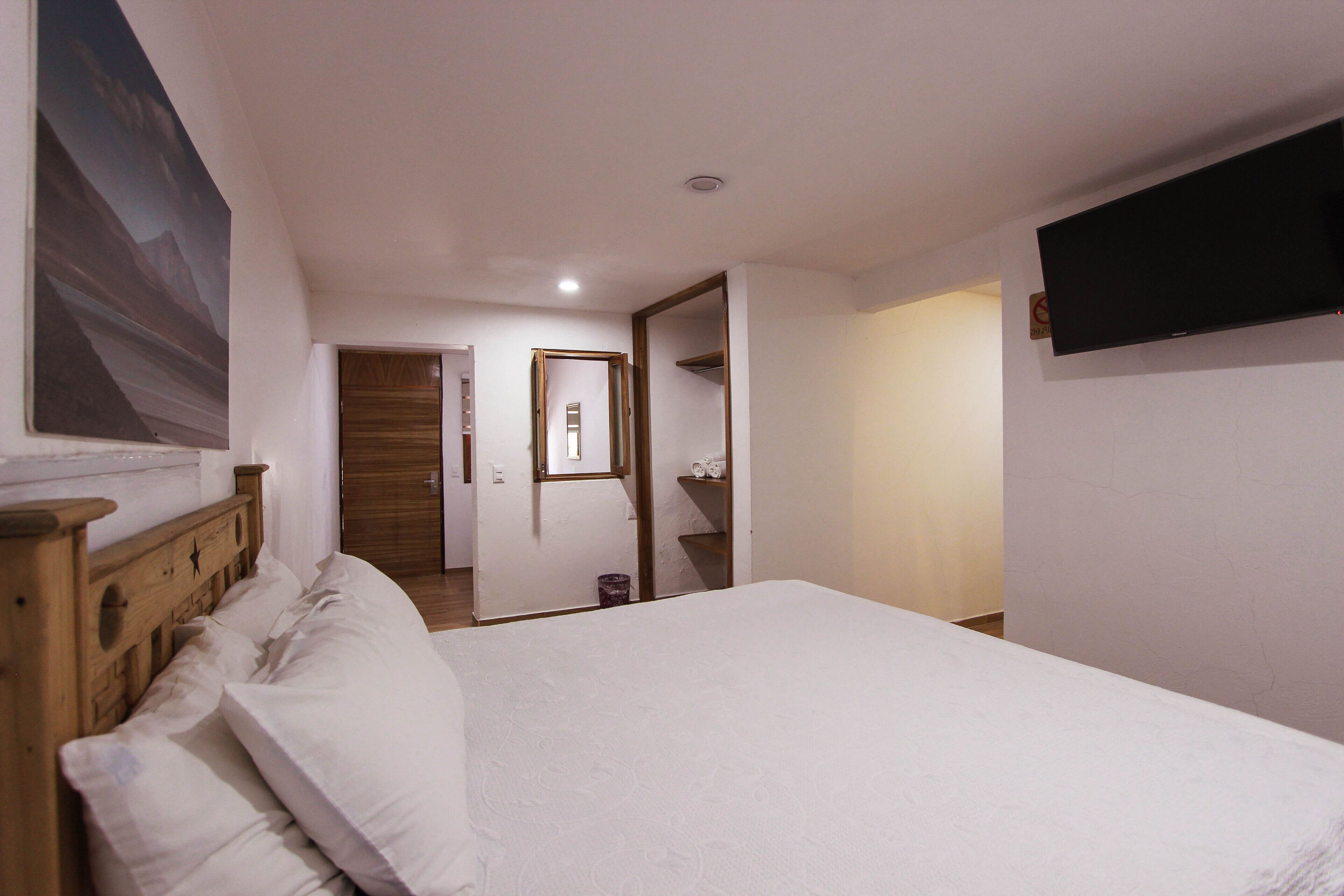 elite studio suite, 1 queen bed | 1 bedroom, desk, laptop workspace, iron/ironing board