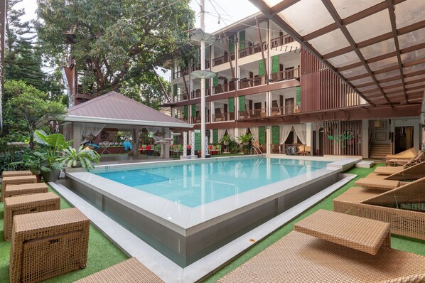 Outdoor pool, pool umbrellas, pool loungers