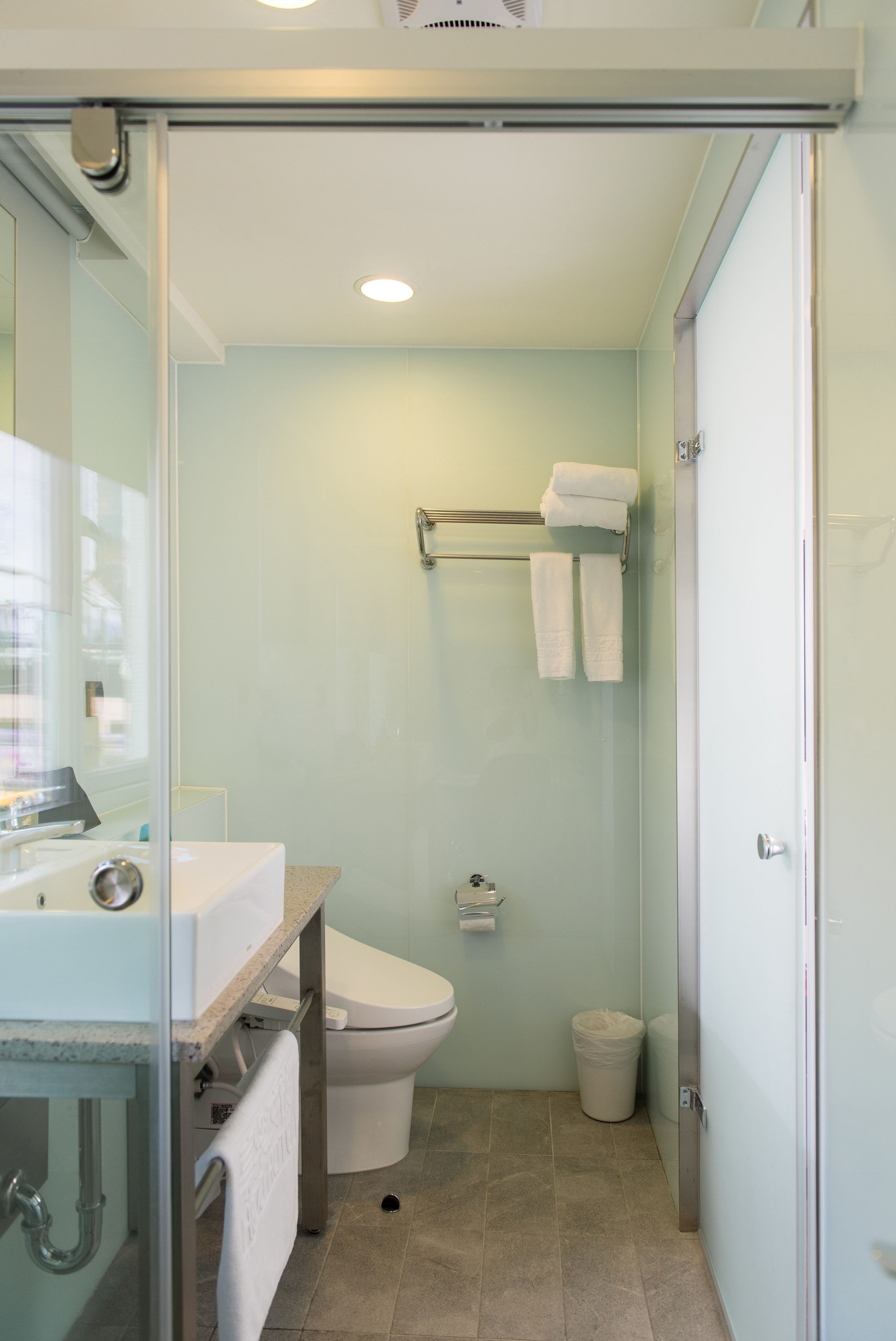 deluxe triple room | bathroom | shower, free toiletries, hair dryer, slippers