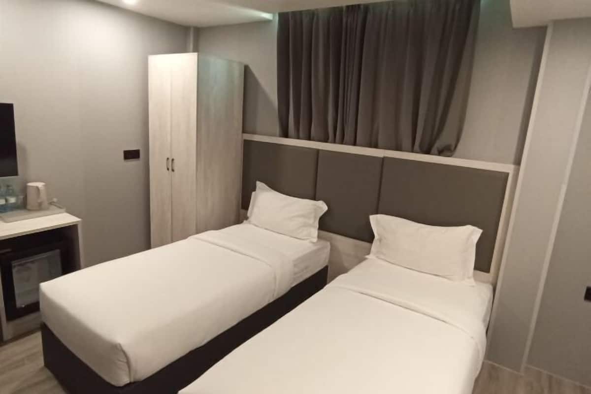 Luxe beddengoed, een minibar, een kluis op de kamer, een bureau