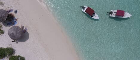 Private beach nearby, white sand