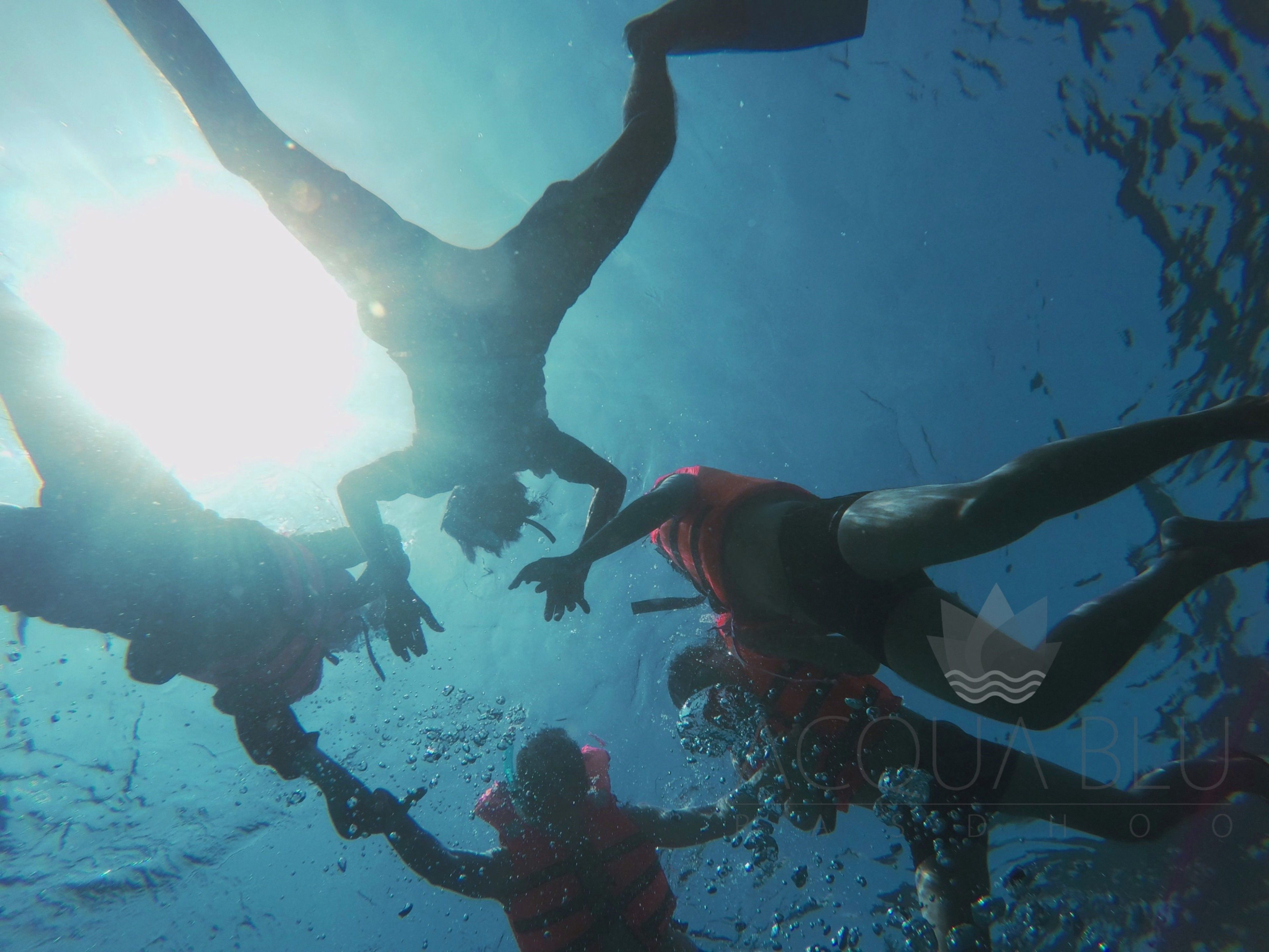 An underwater scene with divers.