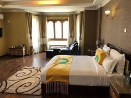 Habitación Deluxe con 1 cama doble o 2 individuales | Minibar, escritorio, camas supletorias y wifi gratis