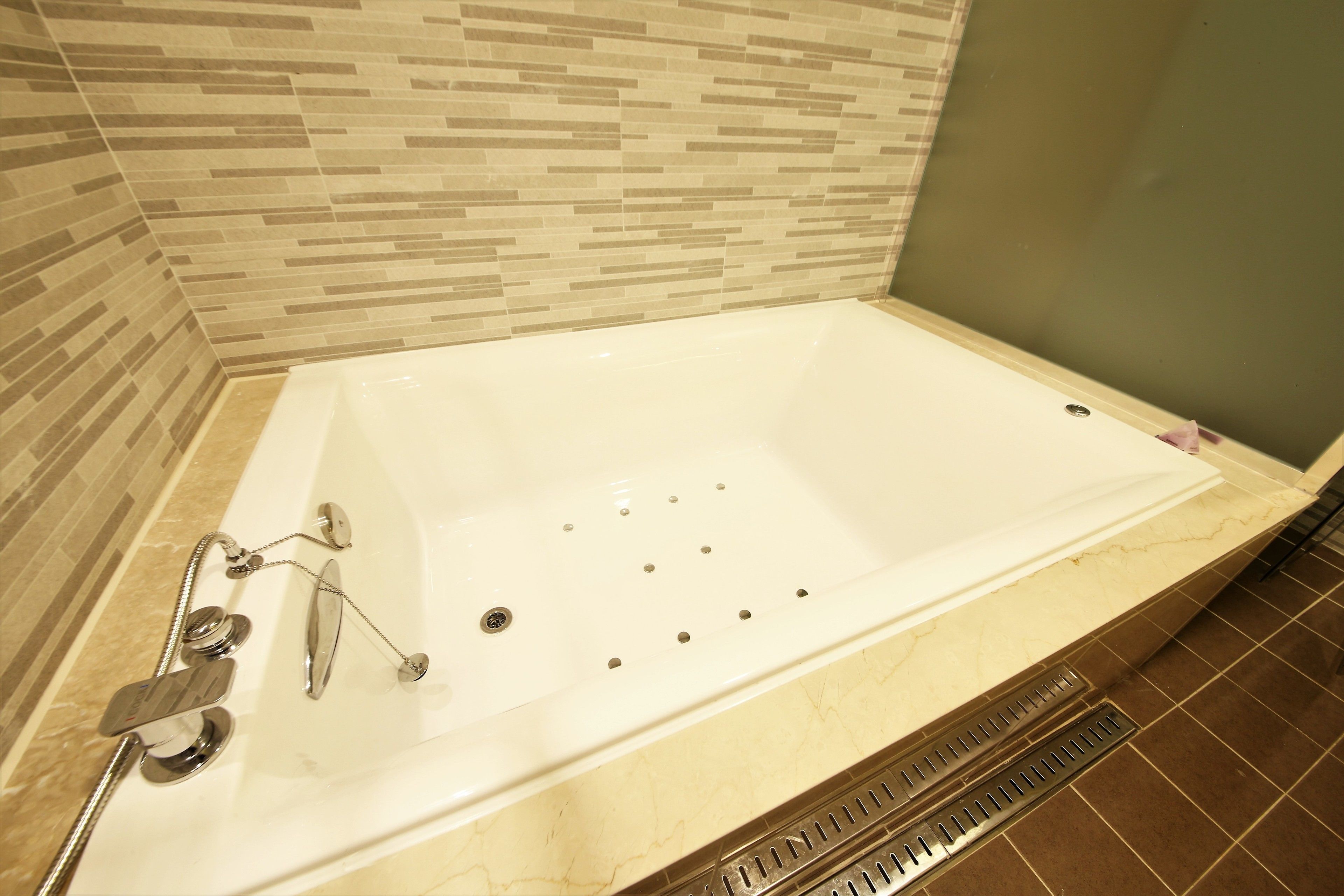 vip | bathroom | combined shower/bathtub, jetted bath, free toiletries, bathrobes