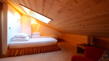 Family Room | Minibar, in-room safe, blackout drapes, free WiFi