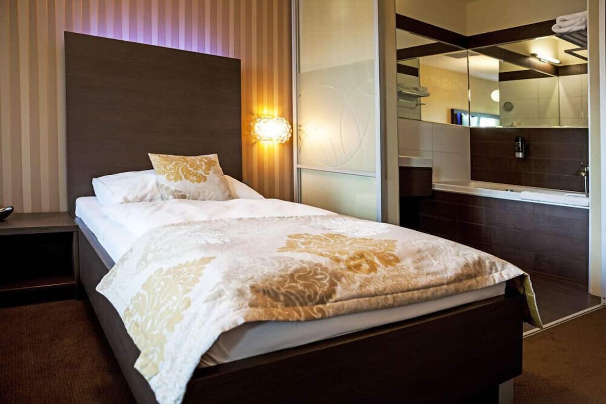 deluxe business room with terrace | premium bedding, minibar, desk, blackout curtains