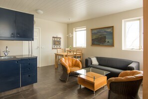 Apartment, 1 Schlafzimmer | Wohnbereich | Flachbildfernseher