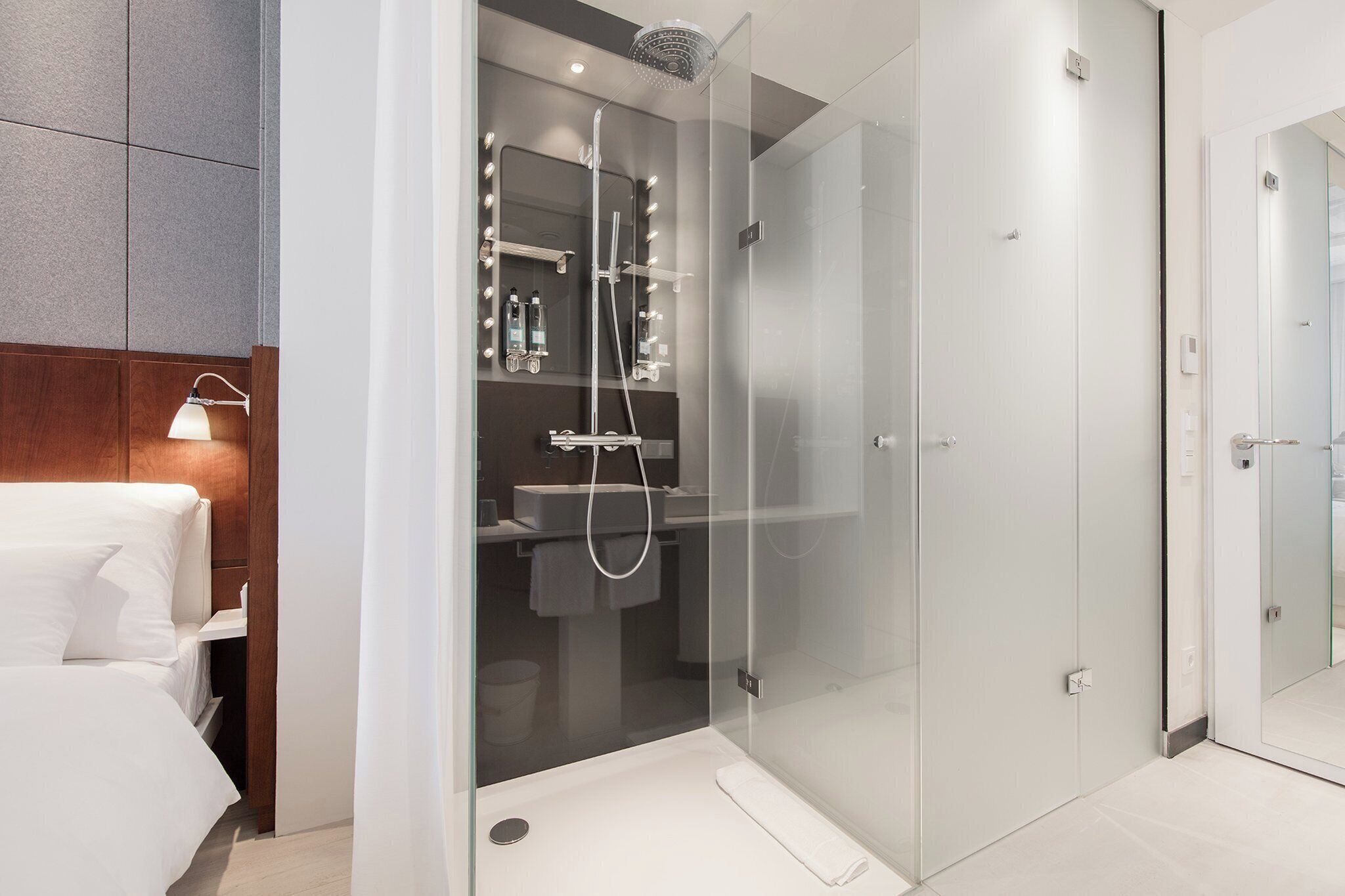 Shower, rainfall showerhead, designer toiletries, hair dryer