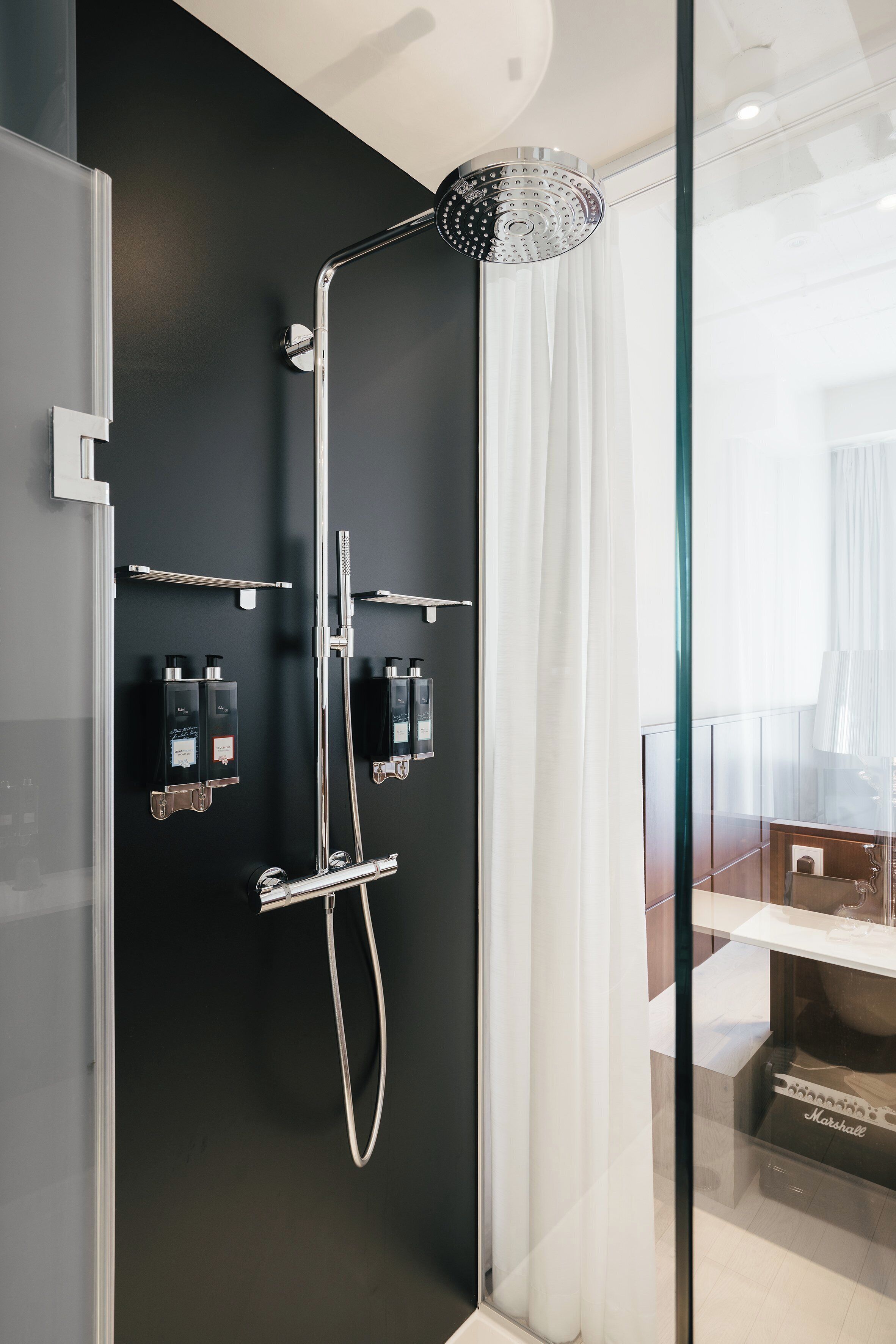 nest room | bathroom | shower, rainfall showerhead, designer toiletries, hair dryer