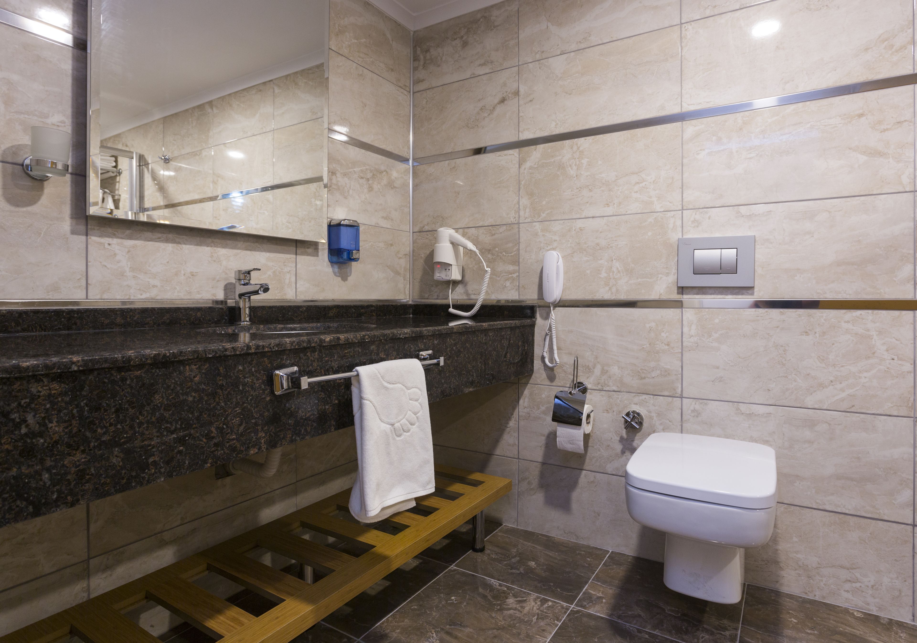 family room | bathroom | shower, free toiletries, hair dryer, towels