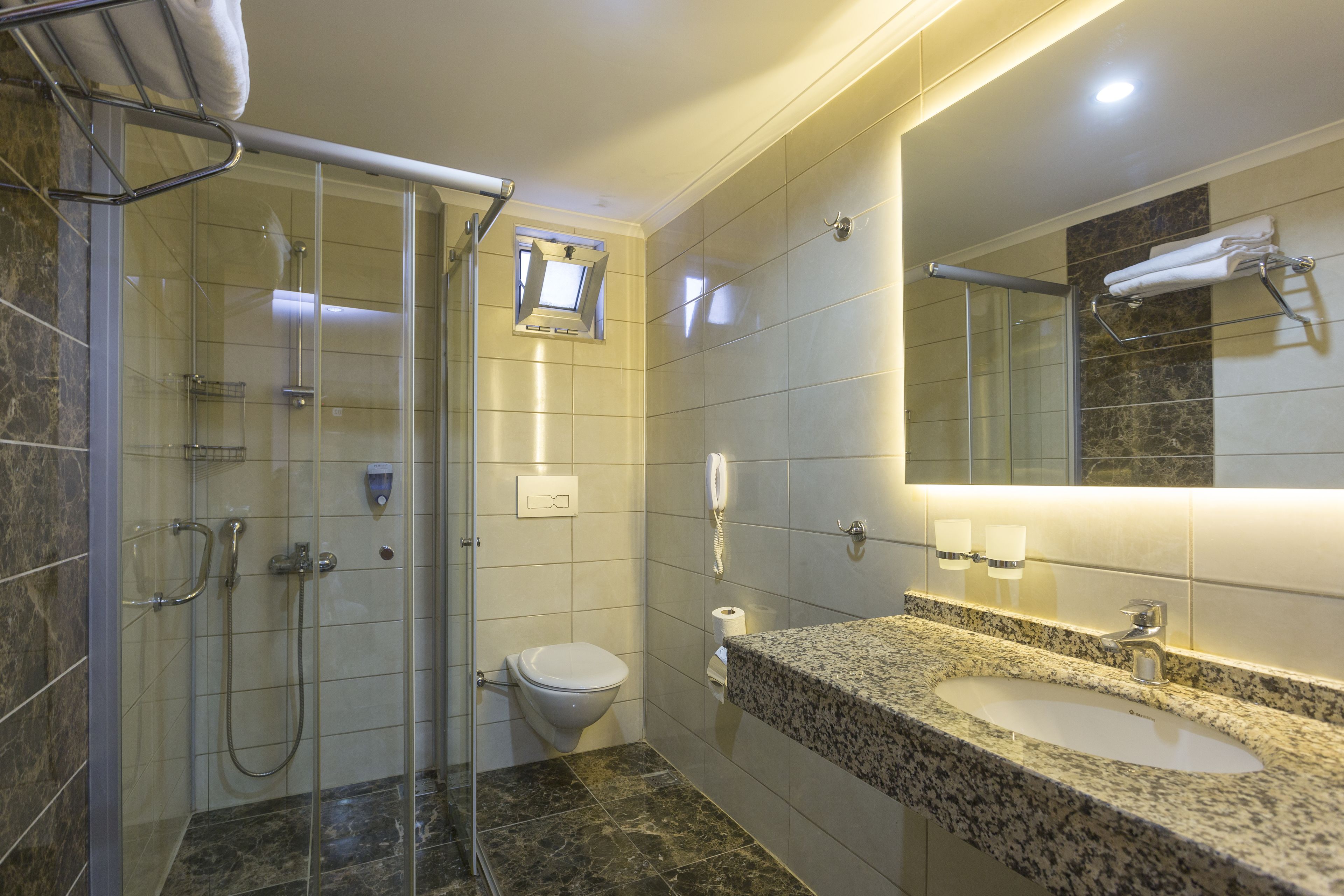 shower, free toiletries, hair dryer, towels