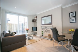 Superior Apartment, 1 Bedroom, Kitchen, City View | Living area | 40-inch flat-screen TV with cable channels, TV