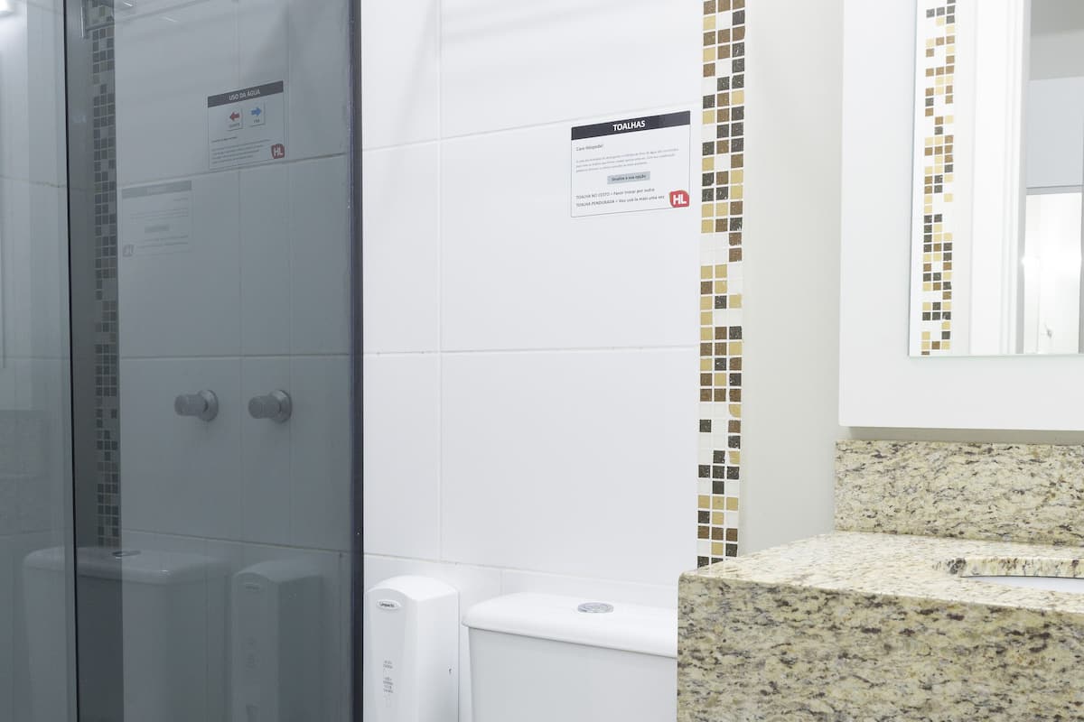 shower, free toiletries, hair dryer, towels