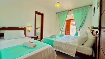 Deluxe Triple Room, 1 Bedroom, Garden View, Ground Floor | Premium bedding, minibar, individually decorated, individually furnished