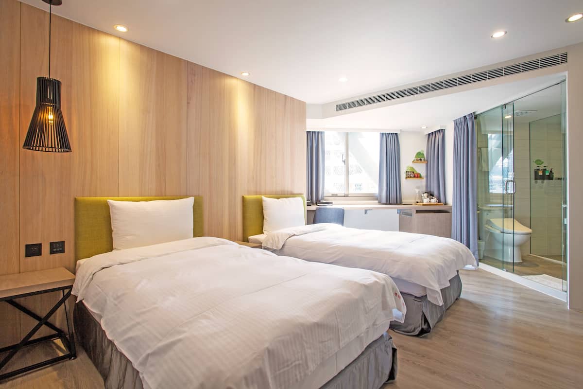 standard twin room | down duvets, free minibar, in-room safe, individually decorated
