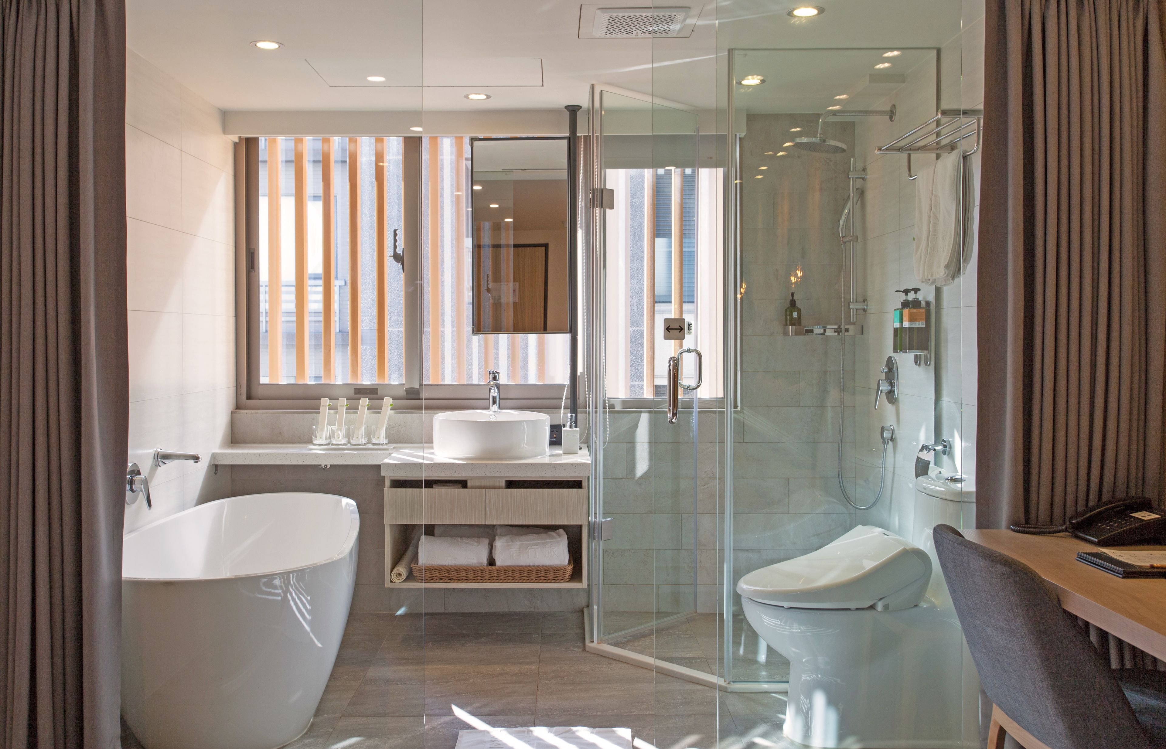 elite quadruple room | bathroom | free toiletries, hair dryer, slippers, towels