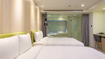 Standard Quadruple Room | Down comforters, free minibar, in-room safe, individually decorated