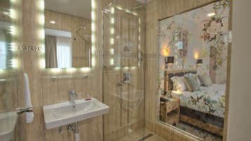Junior Studio Suite, 1 Bedroom, City View | Bathroom | Shower, free toiletries, hair dryer, slippers