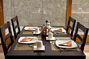 Breakfast, lunch, dinner served; local and international cuisine 