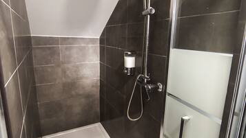Shower, free toiletries, hair dryer, towels