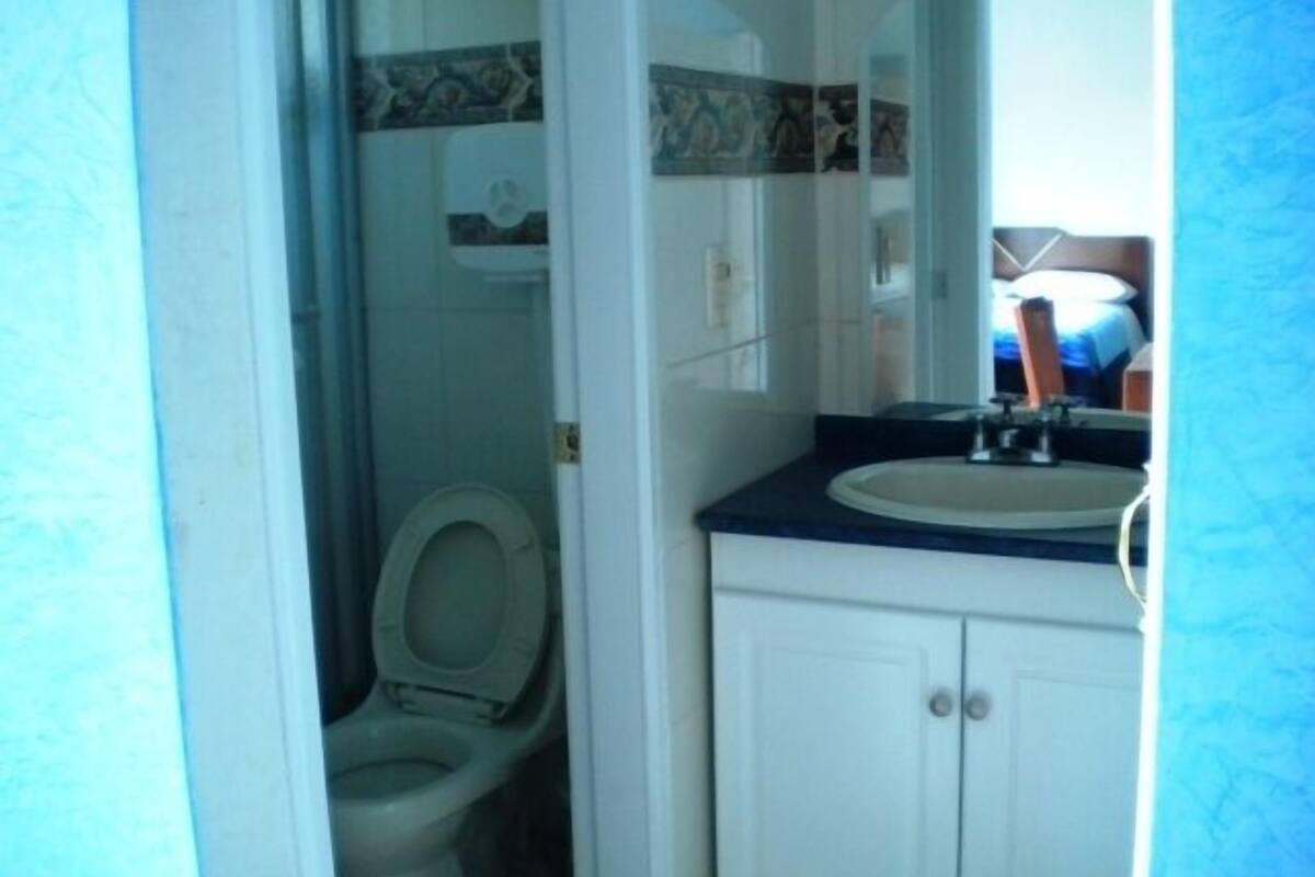 Quadruple Room | Bathroom | Shower, towels