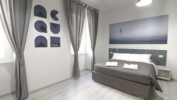 Quarto standard | Escrivaninha, berços (sobretaxa), Wi-Fi de cortesia, roupa de cama