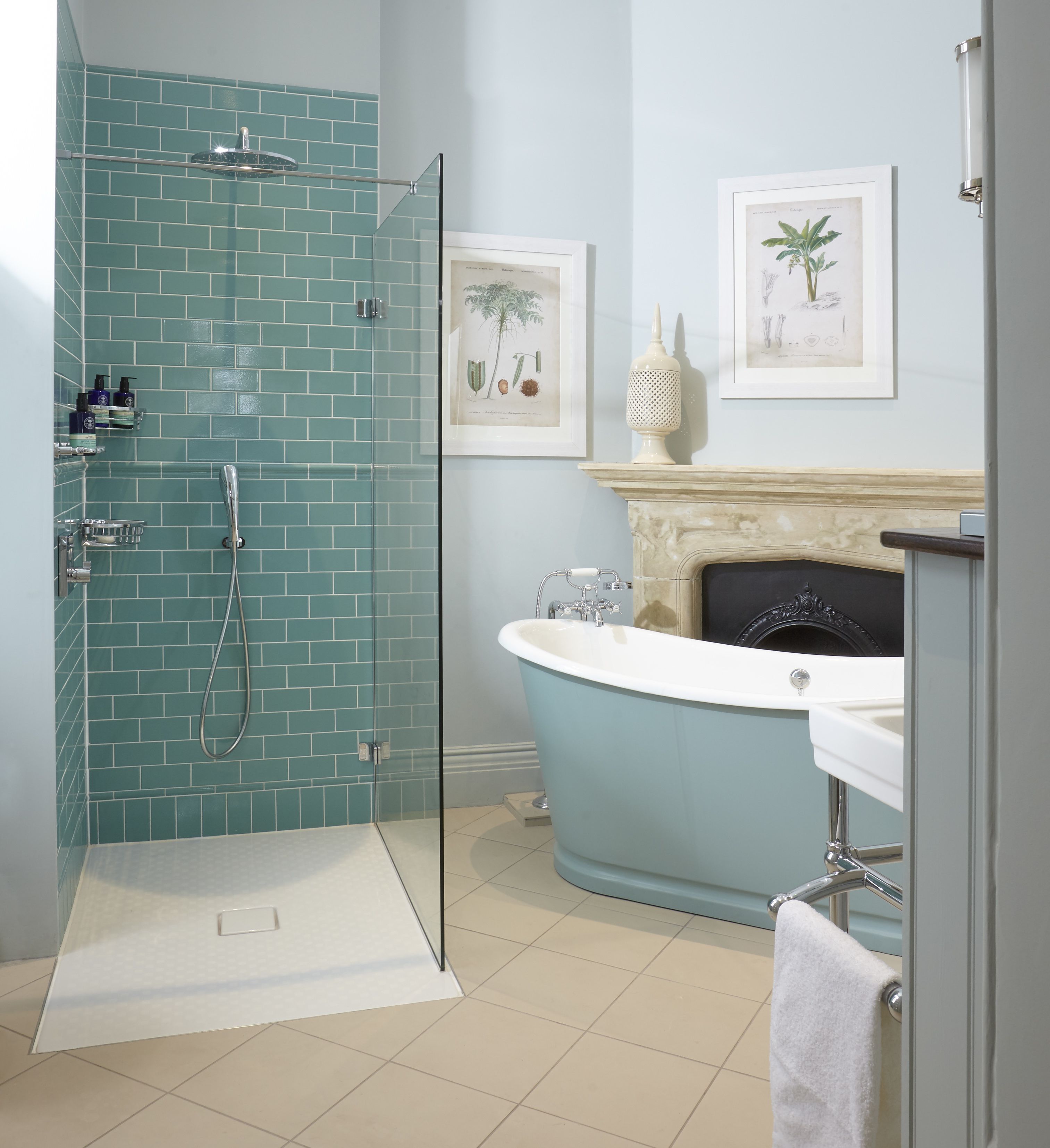 deluxe room | bathroom | rainfall showerhead, free toiletries, hair dryer, bathrobes