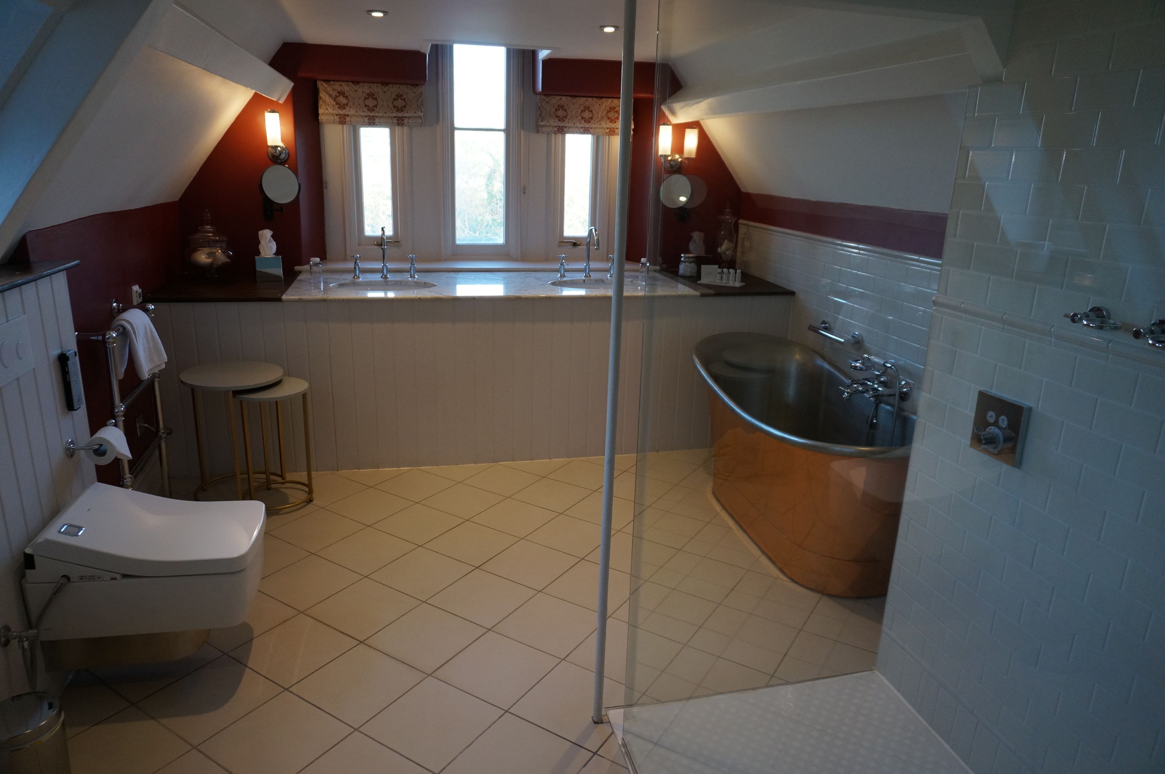 suite | bathroom | rainfall showerhead, free toiletries, hair dryer, bathrobes