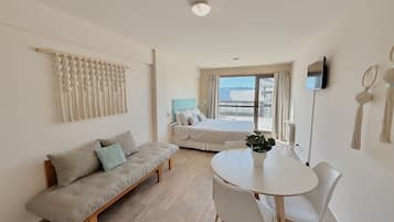 Studio, Lake View | Living area | 32-inch flat-screen TV with cable channels, LED TV