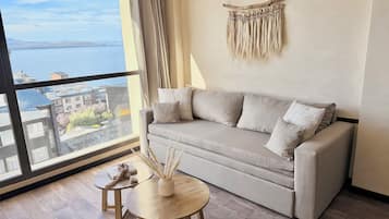 Design Apartment, Lake View | Living area | 32-inch flat-screen TV with cable channels, LED TV