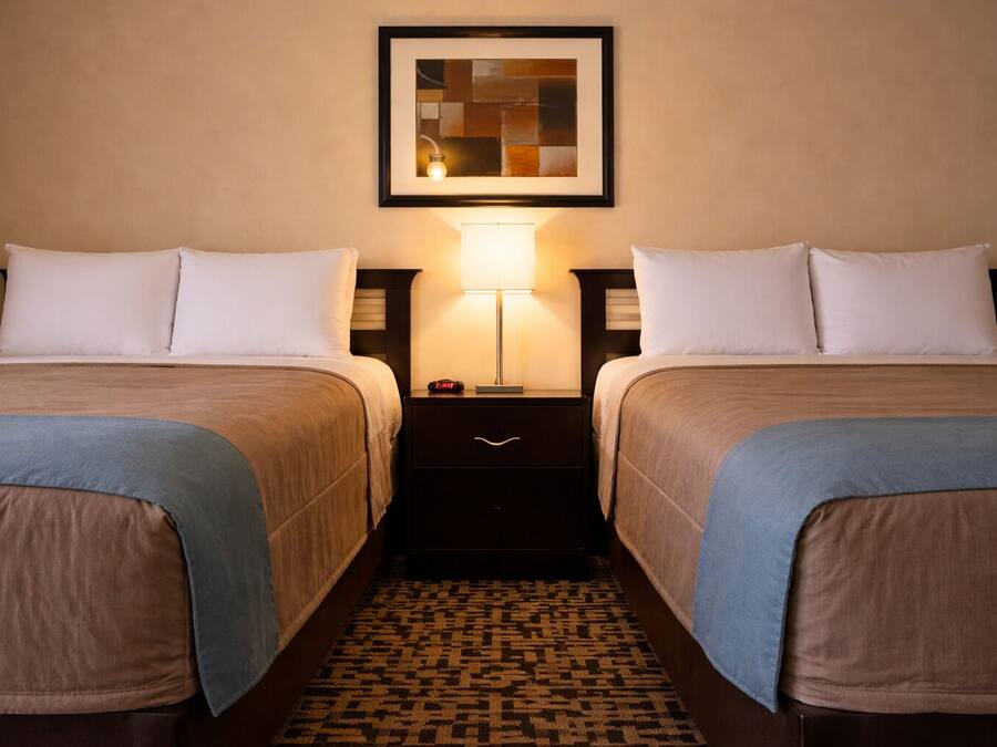 Standard Quadruple Room, 2 Queen Beds | Desk, iron/ironing board, bed sheets