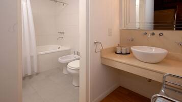 Combined shower/tub, deep soaking tub, hair dryer, towels