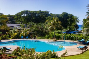 Outdoor pool, pool umbrellas, sun loungers