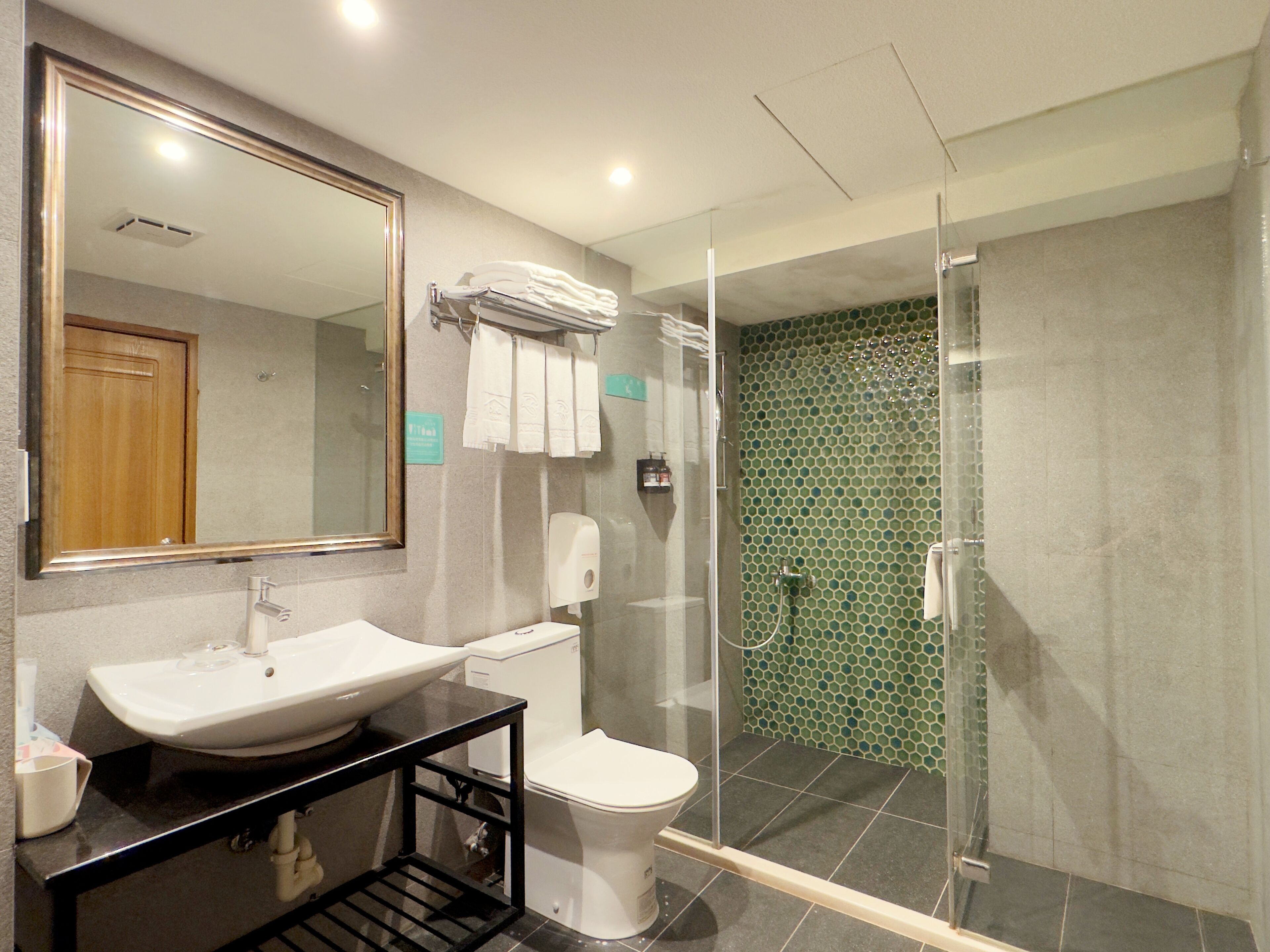 family quadruple room | bathroom | shower, hair dryer, towels, shampoo