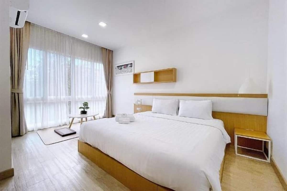 Minibar, desk, blackout drapes, iron/ironing board