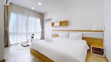 Superior Room | Minibar, desk, blackout drapes, iron/ironing board