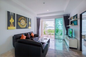 Family 2 Bedrooms Suite | Living room | LCD TV - Phuket Seaview Resotel (Rawai)