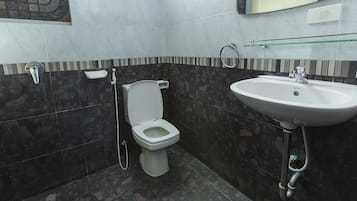 Shower, free toiletries, hair dryer, slippers