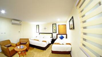 Deluxe Triple Room, Multiple Beds, Non Smoking, Refrigerator | In-room safe, desk, iron/ironing board (on request), free WiFi