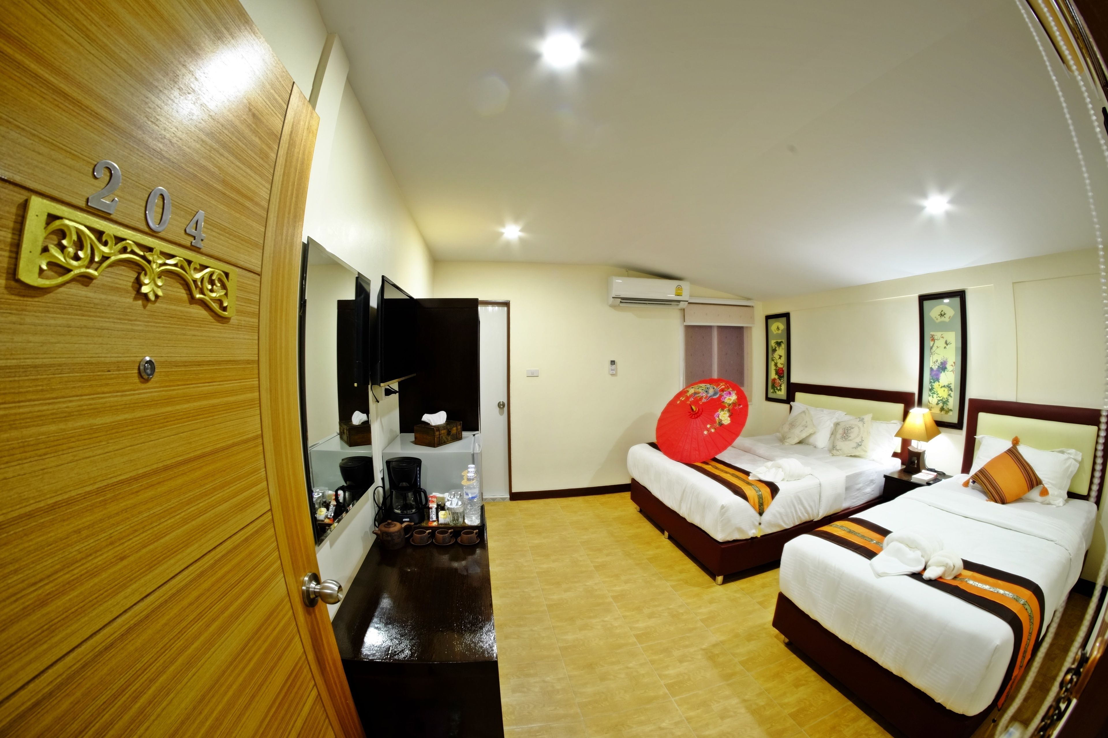 deluxe triple room, multiple beds, non smoking, refrigerator | in-room safe, desk, iron/ironing board, free wifi