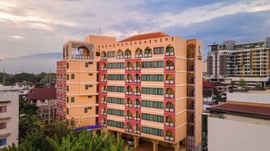 Stunning hotel with arched windows and balconies, offering a unique architectural style.