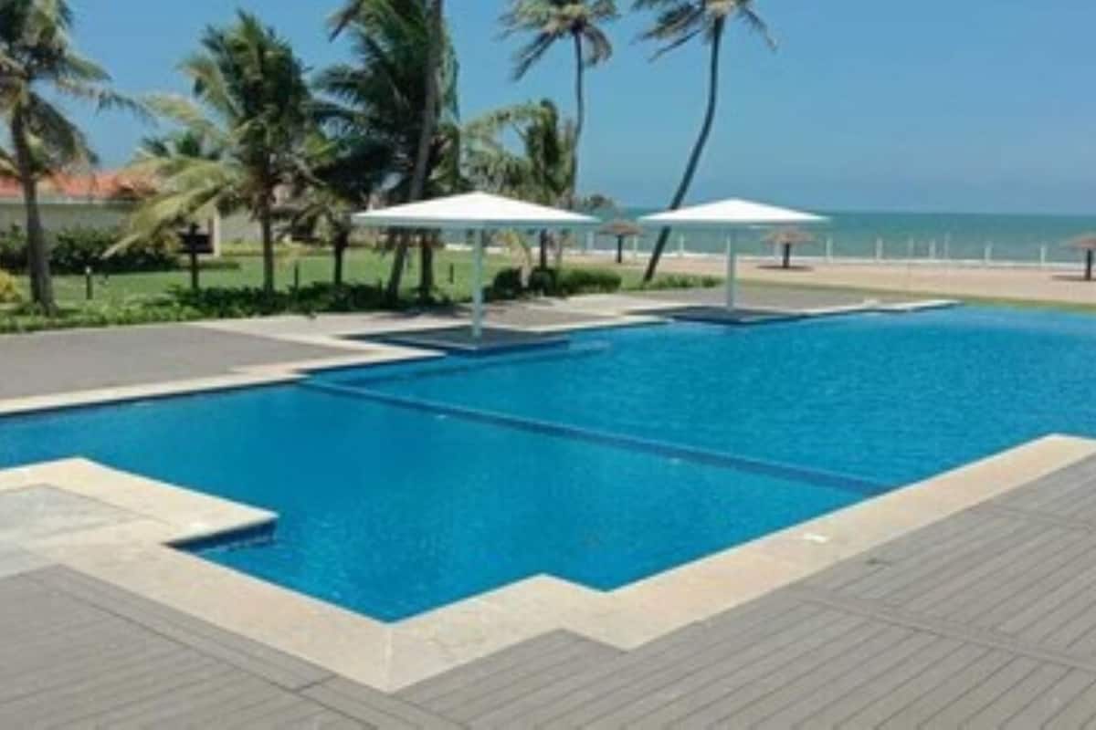 outdoor pool, pool umbrellas, pool loungers