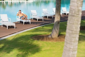 Outdoor pool, open 7:00 AM to 7:00 PM, pool cabanas (surcharge)