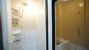 Shower, free toiletries, hair dryer, slippers