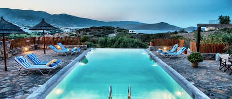 Outdoor pool, pool umbrellas, pool loungers
