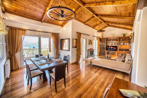 Deluxe Villa, 5 Bedrooms, Private Pool | Living area | 40-inch flat-screen TV with satellite channels, TV, DVD player - Glan Y Mor (Agios Nikolaos)