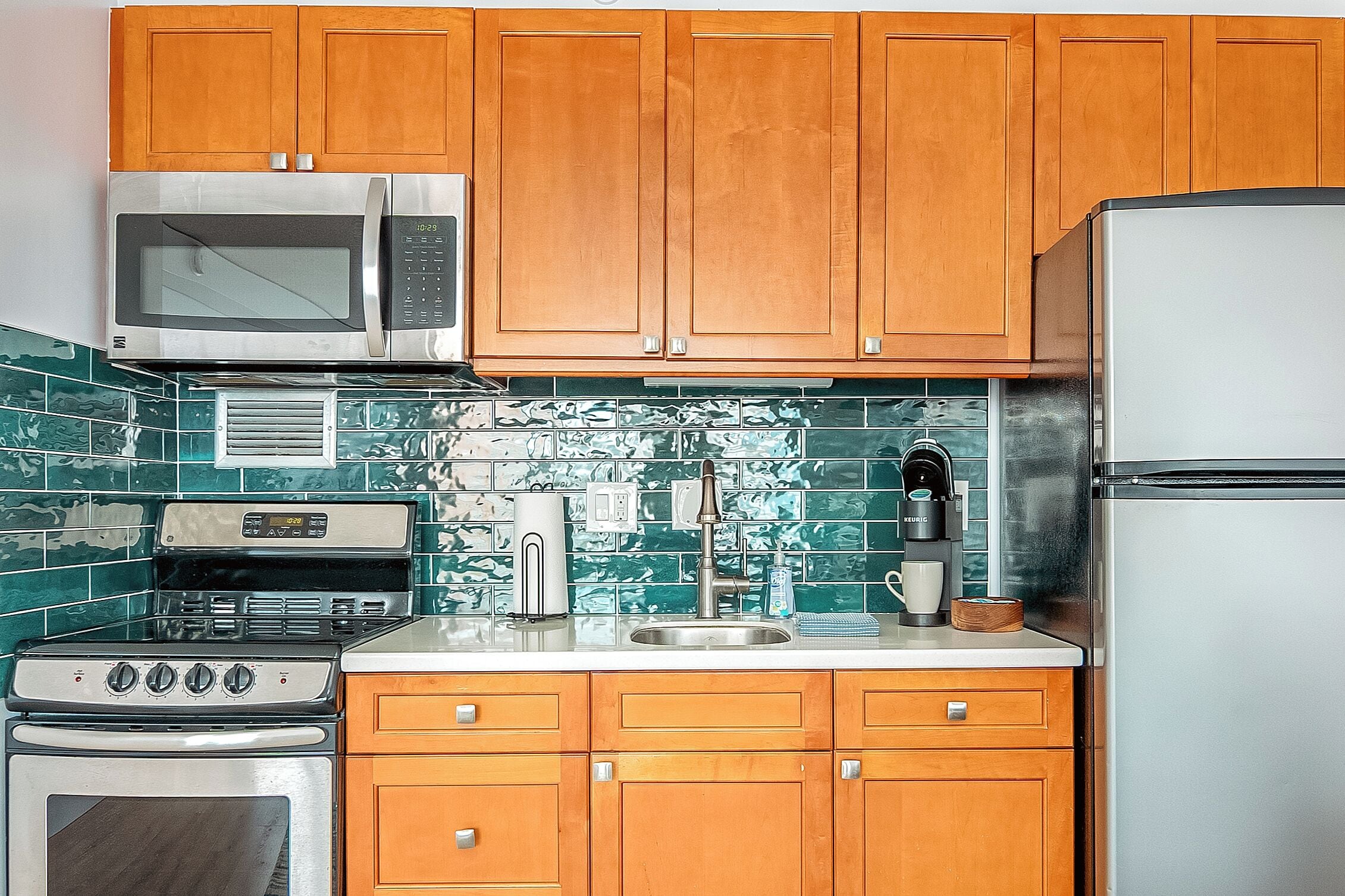 studio suite, kitchen | private kitchen | full-sized fridge, microwave, oven, stovetop